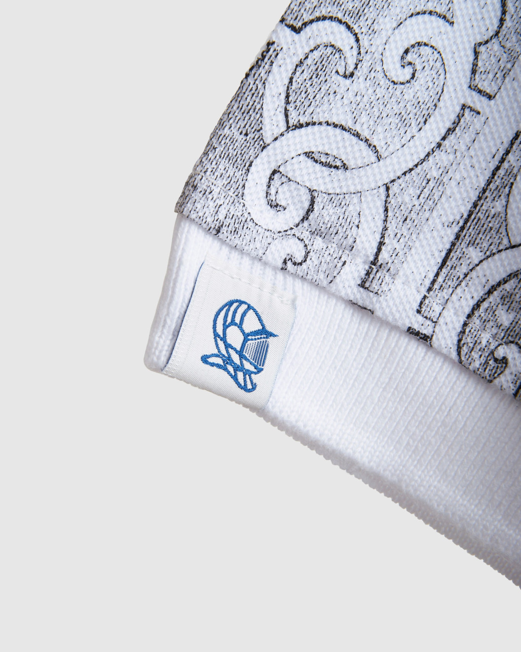 Men's White Pique Polo, with Antique Gate Print Featuring Casual Logo