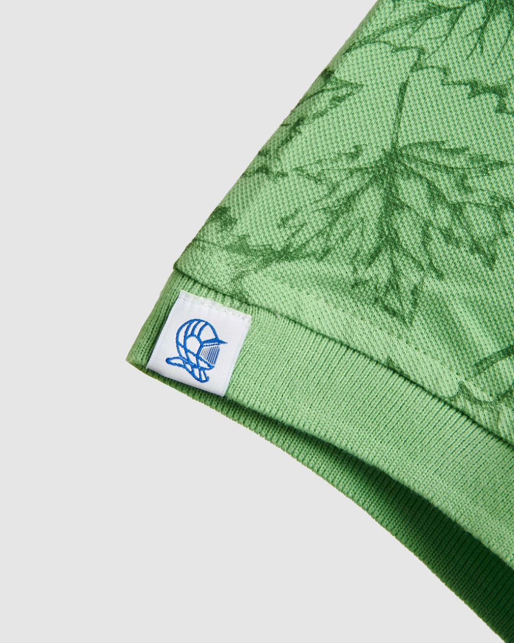 Men's Pastel Green Pique Polo, with Autumn Leaves Print and Casual Society Logo