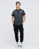 Men's Black Pique Polo, with Antique Gate Print, Featuring Casual Society Logo